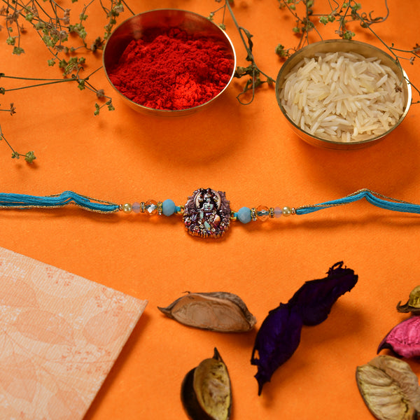 Shri Krishna Divine Charm Rakhi with Blue Beads
